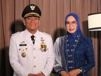 Bupati Luwu Timur, H. Irwan Bachri Syam bersama Ketua TP PKK Luwu Timur.