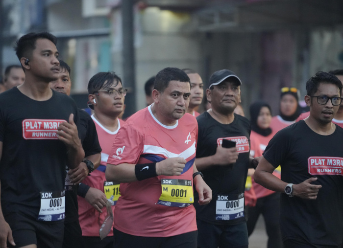 Wali Kota Makassar, Munafri Arifuddin saat mengikuti Makassar Half Marathon 2025.