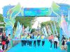 Wakil Gubernur Sulawesi Selatan, Fatmawati Rusdi, saat melepas peserta PLN Mobile Run 2025 di Benteng Rotterdam, Makassar, Minggu (22/6/2025).