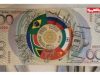 Gambar uang kertas pecahan 200 dengan logo dan simbol negara-negara anggota BRICS beredar luas di media sosial, bertepatan dengan gelaran Konferensi Tingkat Tinggi (KTT) BRICS 2025 di Brasil. Desain uang tersebut memuat bendera dan burung nasional dari lima negara pendiri Brasil, Rusia, India, China, dan Afrika Selatan serta anggota baru seperti Iran dan Uni Emirat Arab (UEA).