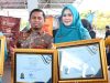 Wali Kota Parepare, Tasming Hamid, menerima penghargaan istimewa dari Menteri Kependudukan dan Pembangunan Keluarga Berencana Nasional (BKKBN), Wihaji, S.Ag., M.Pd, dalam peringatan Hari Keluarga Nasional (Harganas) ke-32 tingkat Provinsi Sulawesi Selatan.