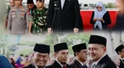 Camat Mamajang, Andi Irdan Pandita, S.STP., M.Si, bersama Sekretaris Camat Mamajang, Andi Muhammad Adri, SH, menerima penghargaan Satya Lencana Karya Satya pada acara penganugerahan yang digelar Pemerintah Kota (Pemkot) Makassar di Tribun Lapangan Karebosi, Jumat (19/12/2025).