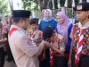 Wali Kota Parepare, Tasming Hamid, melepas Kontingen Kwartir Cabang Gerakan Pramuka Kota Parepare untuk mengikuti Jambore Nasional XII Tahun 2026 di Bumi Perkemahan Pramuka Cibubur, Jakarta. Pelepasan berlangsung di pekarangan Rumah Jabatan Wali Kota Parepare, Senin (3/8/2026).