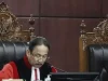 Mahkamah Konstitusi (MK) mengabulkan penarikan kembali permohonan uji materi terhadap Undang-Undang Kepolisian Negara Republik Indonesia yang sebelumnya meminta pembatasan masa jabatan Kepala Kepolisian Negara Republik Indonesia (Kapolri) selama lima tahun dan hanya dapat diperpanjang satu kali.
